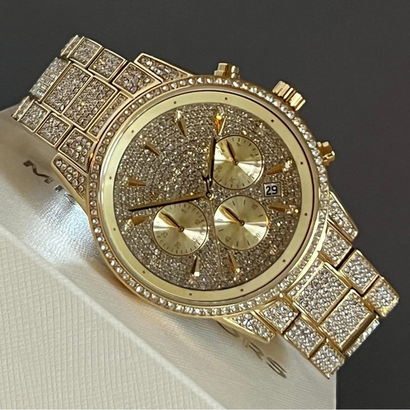 Michael Kors Women’s Ritz Pave Gold-Tone Watch
Case Size: 37mm
MSRP: $725 - Picture 2 of 11